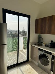 Η κουζίνα ή μικρή κουζίνα στο 47 Appartement luxueux proche de la mer