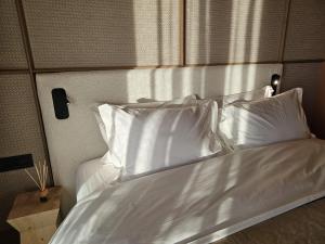 Voodi või voodid majutusasutuse Aparthotel Craiova toas