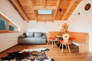 Posezení v ubytování Großkarnaiderhof Appartements-Bauernhof-Natur pur + 37 fotografií