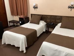 Postel nebo postele na pokoji v ubytování Hotel Folch + 37 fotografií