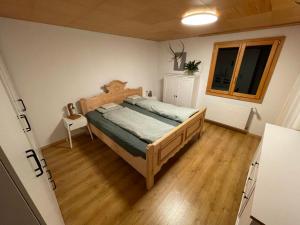 Postel nebo postele na pokoji v ubytování Chalet Talblick
