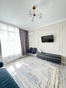 Телевизор и/или развлекательный центр в 1 room возле Мега Парка центр города
