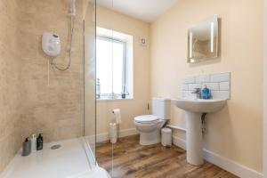 a bathroom with a shower and a toilet and a sink at Apartment with free P for Van. in Southampton +68 photos