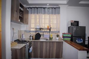 Kuchyň nebo kuchyňský kout v ubytování Summit Side Nanyuki - A One Bedroom Apartment