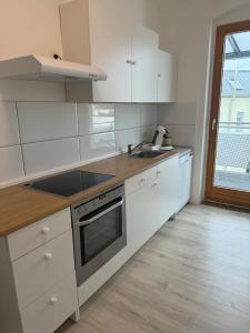 Η κουζίνα ή μικρή κουζίνα στο Apartment 3