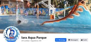 a swimming pool with a water park with a water slide at Suítes Privativas à 100m da Praia "NÃO É CASA INTEIRA" in Beberibe
