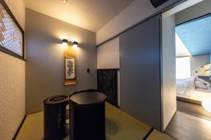 Postel nebo postele na pokoji v ubytování 皆玉邸 恵