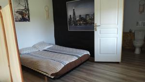 Postel nebo postele na pokoji v ubytování gite "La Renaudaie" - piscine