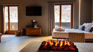 Postel nebo postele na pokoji v ubytování Agarthi Suites - Valtellina