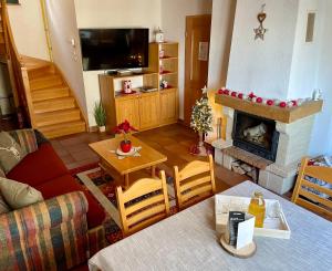 Posezení v ubytování Chalet ANRA Pohorje