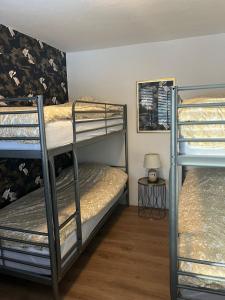 Ένα ή περισσότερα κρεβάτια σε δωμάτιο στο Ferienhaus am Bach