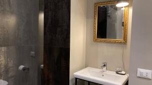 Kúpeľňa v ubytovaní Hotel Calypso