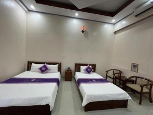 Ένα ή περισσότερα κρεβάτια σε δωμάτιο στο Thúy Tiên Hotel LC - by BAY LUXURY