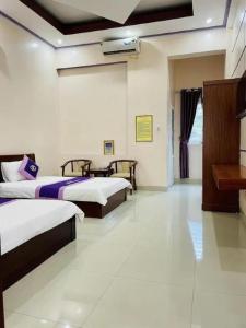 Ένα ή περισσότερα κρεβάτια σε δωμάτιο στο Thúy Tiên Hotel LC - by BAY LUXURY