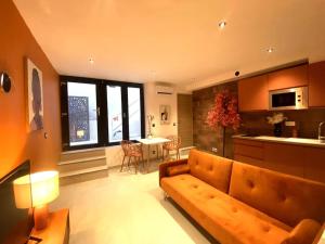 Posezení v ubytování Bulle ocre, renové & climatisé dans le centre