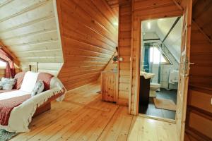 Posteľ alebo postele v izbe v ubytovaní Nosalove Apartamenty