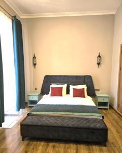 Postel nebo postele na pokoji v ubytování Sahil İnn Hotel Formula 1 view