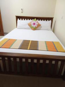 Katil atau katil-katil dalam bilik di Udesh Guest