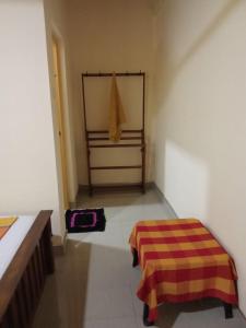 Katil atau katil-katil dalam bilik di Udesh Guest