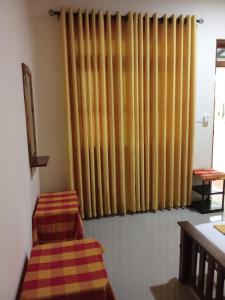 Katil atau katil-katil dalam bilik di Udesh Guest