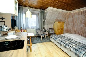 Posteľ alebo postele v izbe v ubytovaní Nosalove Apartamenty