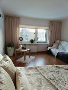 Posteľ alebo postele v izbe v ubytovaní Apartament nad Potokiem