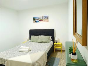 Postel nebo postele na pokoji v ubytování Apartamento RenTenerife Sand & Sea El Medano