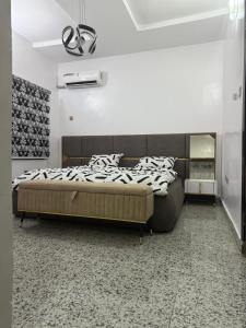 Postel nebo postele na pokoji v ubytování Mercy Apartment + 36 fotografií