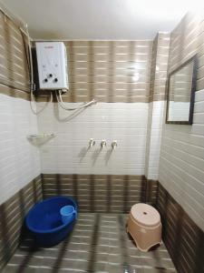 Koupelna v ubytování Sudama Dham Homestay