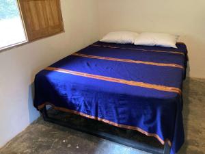 Postel nebo postele na pokoji v ubytování Casa Cascada