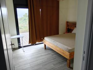 Postel nebo postele na pokoji v ubytování VILLA DES PATISSONS