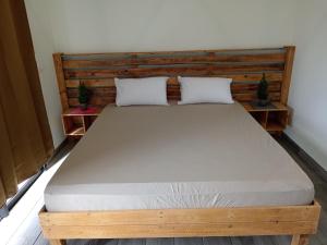 Postel nebo postele na pokoji v ubytování VILLA DES PATISSONS