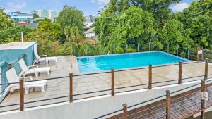 a swimming pool on the roof of a house at leroy place in Kingston
