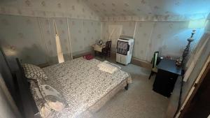 Postel nebo postele na pokoji v ubytování Happy Homestay