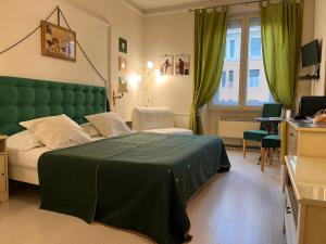 Postel nebo postele na pokoji v ubytování B&B DolceVirginia
