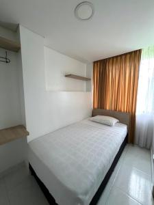Katil atau katil-katil dalam bilik di Hotel Adel