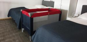 Ένα ή περισσότερα κρεβάτια σε δωμάτιο στο Noord-Hollands Hof Dream