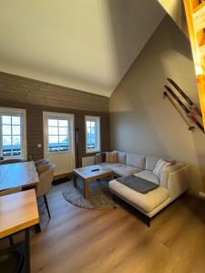 Posezení v ubytování Cozy Apartment - Great View!