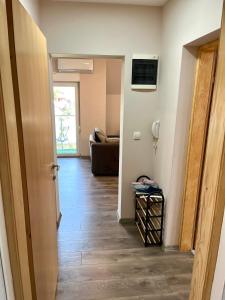 TV a/nebo společenská místnost v ubytování Apartman KVINS