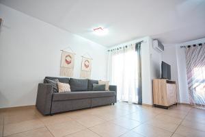 A television and/or entertainment centre at Apartment Jilguero Sunny