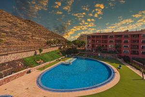 The swimming pool at or close to Apartment Jilguero Sunny