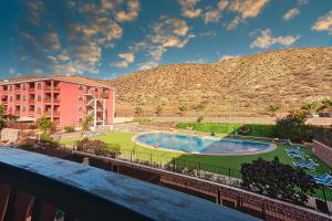 The swimming pool at or close to Apartment Jilguero Sunny
