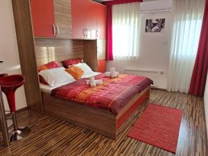 Voodi või voodid majutusasutuse Apartmaji Paradiso toas