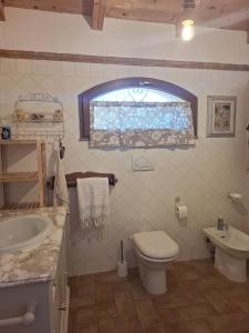 Koupelna v ubytování C'era una casa