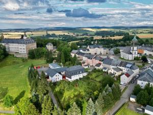 an aerial view of a small town with buildings at Bahnhof Frauenstein Wartehalle in Frauenstein