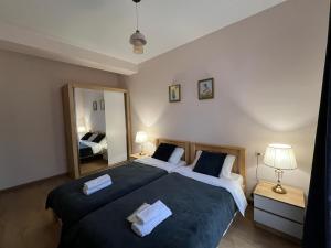 Una cama o camas en una habitación de Sunny Villa 2