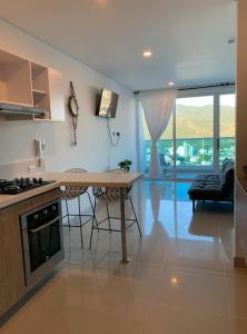 Kuchyň nebo kuchyňský kout v ubytování Lujoso Apartamento tipo loft