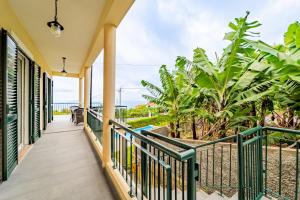 a balcony with a view of the ocean at Casa Dolce Vita in Ponta do Sol