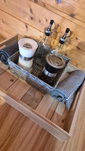 a tray with two coffee makers on a wooden table at Suita 305 in Kranjska Gora