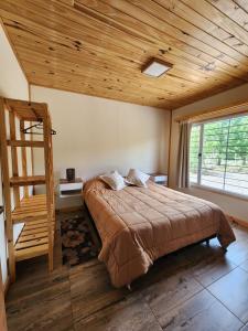 En eller flere senge i et værelse på CasaQH